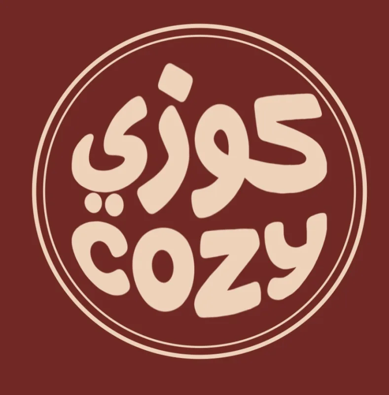 شعار مطعم كوزي — من عملاء طَلب